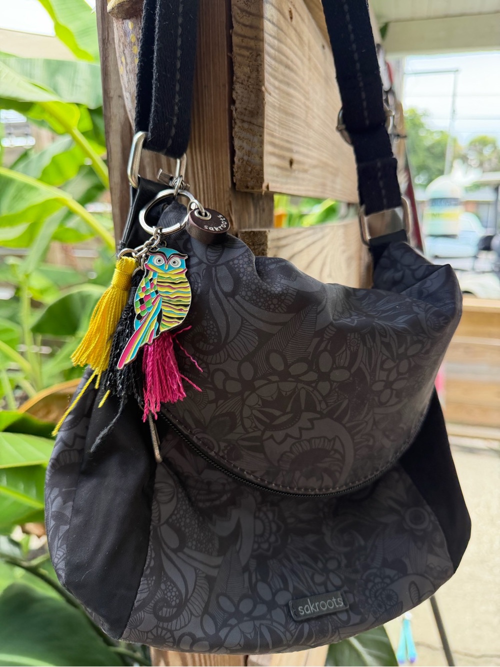 Sakroots Black Floral Shoulder Bag with Colorful Owl Tassel